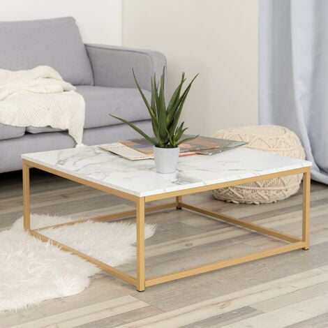 découvrez la table basse effie, une pièce au design moderne et épuré qui allie élégance et fonctionnalité. parfaite pour sublimer votre salon, elle offre une touche contemporaine et chaleureuse à votre décoration intérieure.